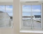 Hus/villa Funktionelt rækkehus i 2 plan med terrasse og balkon