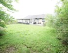 Hus/villa Hyggeligt gulstenshus med carport