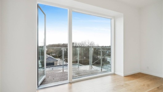 Lejlighed Optimal udnyttet 3 værelses bolig med stor altan og køkkenø