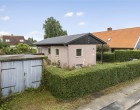 Hus/villa Et hyggeligt hus med plads til både opbevaring og udeliv